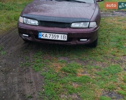 Черный Мазда 626, объемом двигателя 2 л и пробегом 416 тыс. км за 1700 $, фото 1 на Automoto.ua