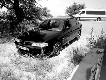 Чорний Мазда 626, об'ємом двигуна 2 л та пробігом 300 тис. км за 1800 $, фото 1 на Automoto.ua