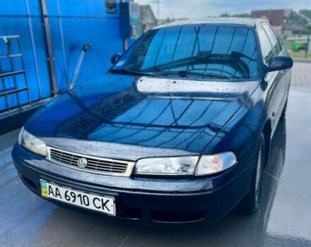 Черный Мазда 626, объемом двигателя 1.8 л и пробегом 300 тыс. км за 1450 $, фото 1 на Automoto.ua