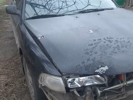 Черный Мазда 626, объемом двигателя 1.8 л и пробегом 520 тыс. км за 1900 $, фото 1 на Automoto.ua