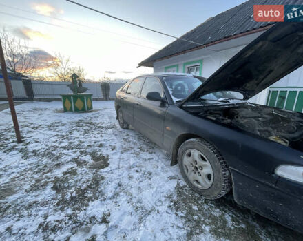 Чорний Мазда 626, об'ємом двигуна 1.99 л та пробігом 200 тис. км за 708 $, фото 1 на Automoto.ua