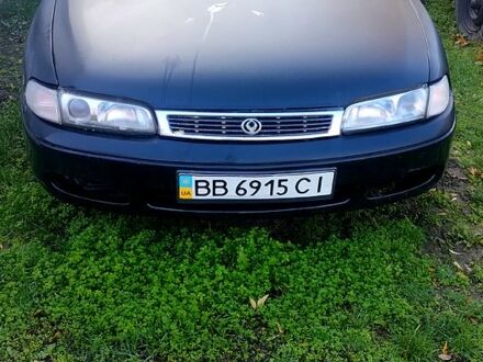 Черный Мазда 626, объемом двигателя 2 л и пробегом 200 тыс. км за 2000 $, фото 1 на Automoto.ua