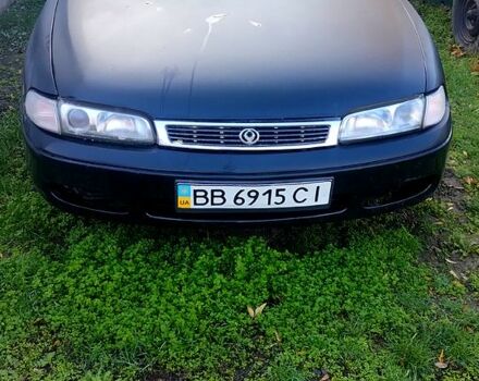 Черный Мазда 626, объемом двигателя 2 л и пробегом 200 тыс. км за 2000 $, фото 1 на Automoto.ua