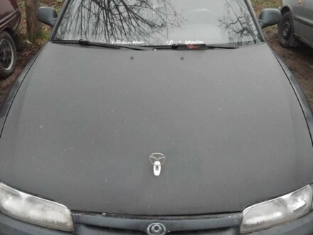 Черный Мазда 626, объемом двигателя 1.8 л и пробегом 1 тыс. км за 2500 $, фото 1 на Automoto.ua