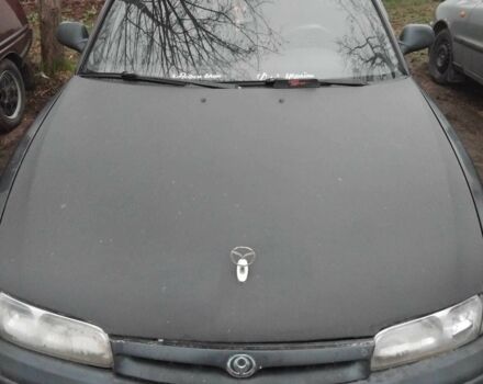 Чорний Мазда 626, об'ємом двигуна 1.8 л та пробігом 1 тис. км за 2500 $, фото 1 на Automoto.ua