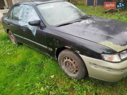 Черный Мазда 626, объемом двигателя 0 л и пробегом 250 тыс. км за 1250 $, фото 1 на Automoto.ua