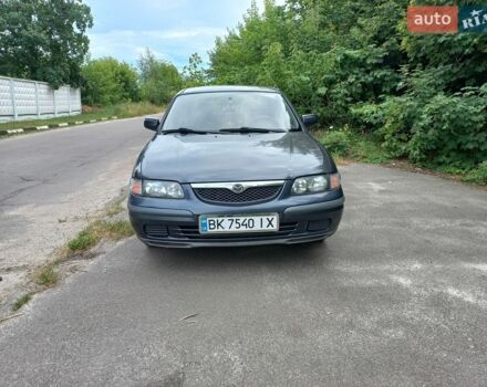 Черный Мазда 626, объемом двигателя 2 л и пробегом 253 тыс. км за 1800 $, фото 1 на Automoto.ua