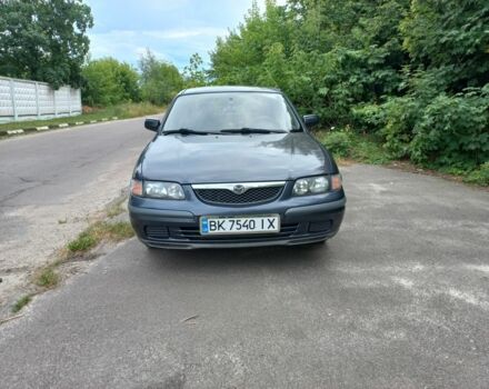 Черный Мазда 626, объемом двигателя 2 л и пробегом 253 тыс. км за 1800 $, фото 1 на Automoto.ua