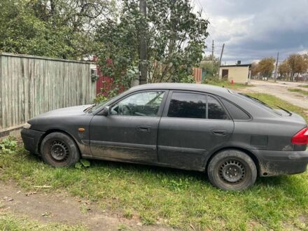 Черный Мазда 626, объемом двигателя 0 л и пробегом 330 тыс. км за 483 $, фото 1 на Automoto.ua