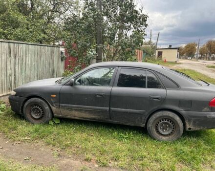 Черный Мазда 626, объемом двигателя 0 л и пробегом 330 тыс. км за 534 $, фото 1 на Automoto.ua
