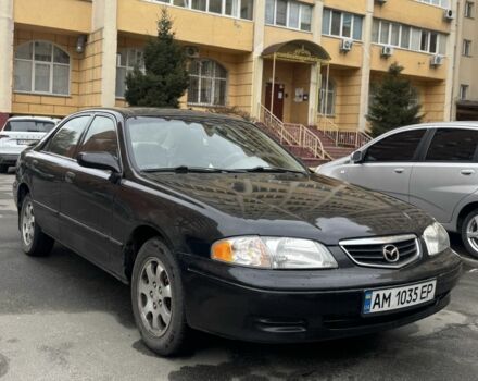 Черный Мазда 626, объемом двигателя 2 л и пробегом 259 тыс. км за 2200 $, фото 1 на Automoto.ua