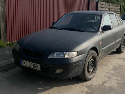 Мазда 626 2000 у Житомирі на Automoto.ua Чорний Мазда 626, об'ємом двигуна 2 л та пробігом 220 тис. км за 450 $, фото 1 на Automoto.ua