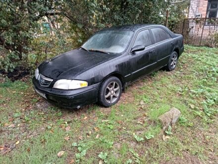 Мазда 626 2001 у Никополе на Automoto.ua Чорний Мазда 626, об'ємом двигуна 2 л та пробігом 123 тис. км за 950 $, фото 1 на Automoto.ua