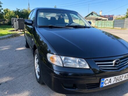 Черный Мазда 626, объемом двигателя 1.99 л и пробегом 2 тыс. км за 2499 $, фото 1 на Automoto.ua