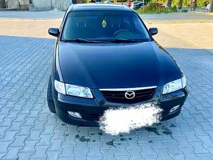 Чорний Мазда 626, об'ємом двигуна 2 л та пробігом 208 тис. км за 3000 $, фото 1 на Automoto.ua