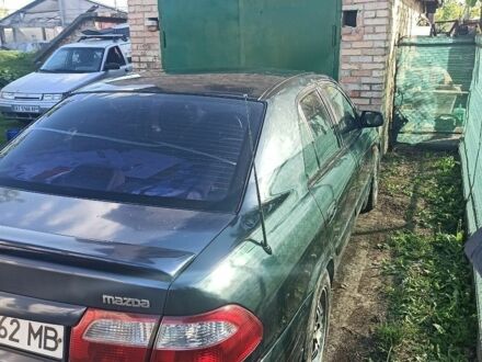 Черный Мазда 626, объемом двигателя 2 л и пробегом 260 тыс. км за 2008 $, фото 1 на Automoto.ua