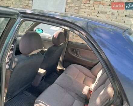 Фиолетовый Мазда 626, объемом двигателя 2 л и пробегом 300 тыс. км за 2100 $, фото 2 на Automoto.ua