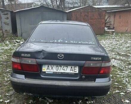 Фиолетовый Мазда 626, объемом двигателя 2 л и пробегом 340 тыс. км за 1900 $, фото 2 на Automoto.ua