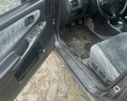 Фиолетовый Мазда 626, объемом двигателя 2 л и пробегом 340 тыс. км за 1900 $, фото 5 на Automoto.ua