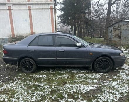 Фиолетовый Мазда 626, объемом двигателя 2 л и пробегом 340 тыс. км за 1900 $, фото 1 на Automoto.ua