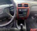 Фиолетовый Мазда 626, объемом двигателя 2 л и пробегом 370 тыс. км за 1800 $, фото 1 на Automoto.ua