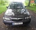Фиолетовый Мазда 626, объемом двигателя 1.99 л и пробегом 330 тыс. км за 3700 $, фото 3 на Automoto.ua