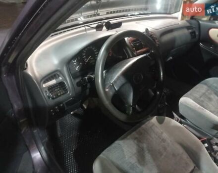 Фіолетовий Мазда 626, об'ємом двигуна 1.8 л та пробігом 350 тис. км за 2500 $, фото 32 на Automoto.ua