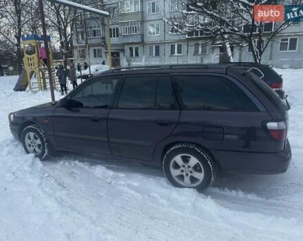 Фиолетовый Мазда 626, объемом двигателя 1.99 л и пробегом 350 тыс. км за 2800 $, фото 1 на Automoto.ua