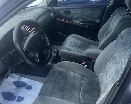 Фиолетовый Мазда 626, объемом двигателя 1.99 л и пробегом 350 тыс. км за 2800 $, фото 7 на Automoto.ua