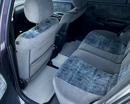 Фиолетовый Мазда 626, объемом двигателя 2 л и пробегом 350 тыс. км за 2800 $, фото 6 на Automoto.ua