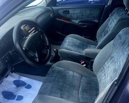 Фиолетовый Мазда 626, объемом двигателя 2 л и пробегом 350 тыс. км за 2800 $, фото 8 на Automoto.ua