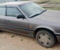 Коричневый Мазда 626, объемом двигателя 2.2 л и пробегом 222 тыс. км за 999 $, фото 1 на Automoto.ua