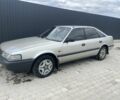 Коричневый Мазда 626, объемом двигателя 2 л и пробегом 233 тыс. км за 1750 $, фото 1 на Automoto.ua