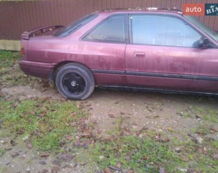 Коричневый Мазда 626, объемом двигателя 2 л и пробегом 150 тыс. км за 850 $, фото 4 на Automoto.ua