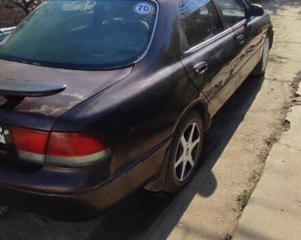 Коричневый Мазда 626, объемом двигателя 1.8 л и пробегом 200 тыс. км за 1161 $, фото 3 на Automoto.ua