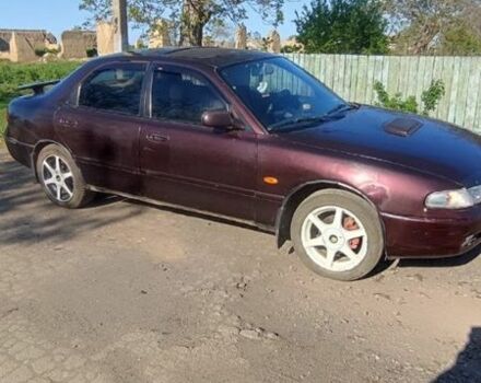 Коричневый Мазда 626, объемом двигателя 1.8 л и пробегом 200 тыс. км за 1161 $, фото 1 на Automoto.ua