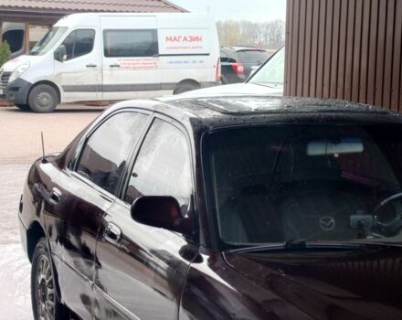 Коричневий Мазда 626, об'ємом двигуна 2 л та пробігом 304 тис. км за 1600 $, фото 10 на Automoto.ua