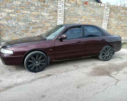 Коричневый Мазда 626, объемом двигателя 2 л и пробегом 250 тыс. км за 1700 $, фото 4 на Automoto.ua