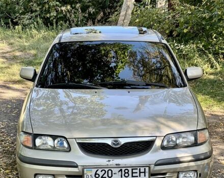 Коричневый Мазда 626, объемом двигателя 2 л и пробегом 169 тыс. км за 4500 $, фото 1 на Automoto.ua