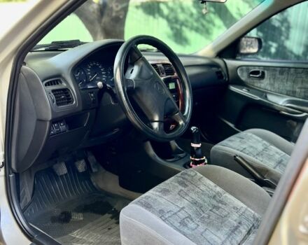 Коричневый Мазда 626, объемом двигателя 2 л и пробегом 169 тыс. км за 4500 $, фото 12 на Automoto.ua