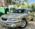 Коричневий Мазда 626, об'ємом двигуна 2 л та пробігом 169 тис. км за 4500 $, фото 1 на Automoto.ua