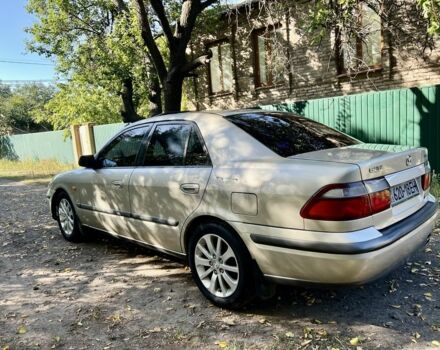 Коричневый Мазда 626, объемом двигателя 2 л и пробегом 169 тыс. км за 4500 $, фото 4 на Automoto.ua