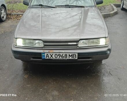 Коричневый Мазда 626, объемом двигателя 2 л и пробегом 245 тыс. км за 700 $, фото 1 на Automoto.ua