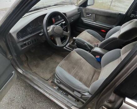 Коричневый Мазда 626, объемом двигателя 2 л и пробегом 245 тыс. км за 700 $, фото 1 на Automoto.ua