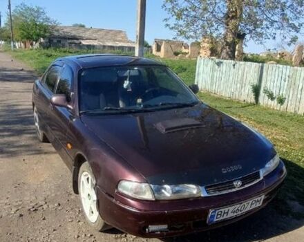 Коричневый Мазда 626, объемом двигателя 1.8 л и пробегом 200 тыс. км за 1161 $, фото 1 на Automoto.ua