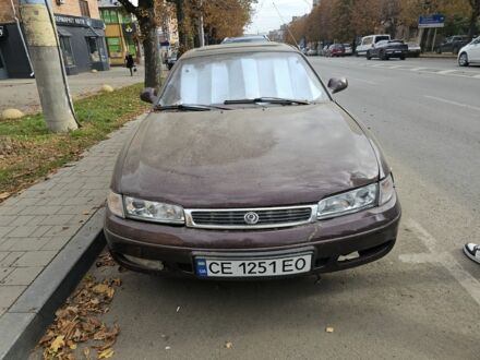 Коричневый Мазда 626, объемом двигателя 2 л и пробегом 290 тыс. км за 1150 $, фото 1 на Automoto.ua