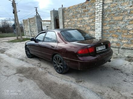 Коричневый Мазда 626, объемом двигателя 2 л и пробегом 250 тыс. км за 1700 $, фото 1 на Automoto.ua