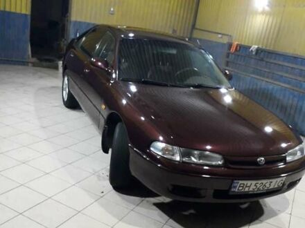 Коричневый Мазда 626, объемом двигателя 2 л и пробегом 300 тыс. км за 3300 $, фото 1 на Automoto.ua