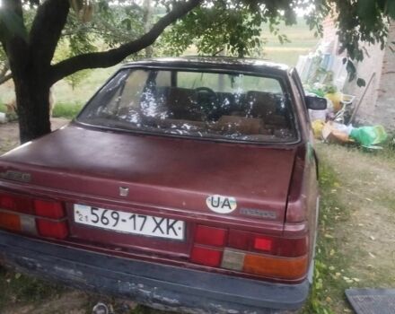 Червоний Мазда 626, об'ємом двигуна 1.6 л та пробігом 272 тис. км за 301 $, фото 3 на Automoto.ua