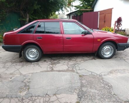 Красный Мазда 626, объемом двигателя 2 л и пробегом 250 тыс. км за 1212 $, фото 2 на Automoto.ua